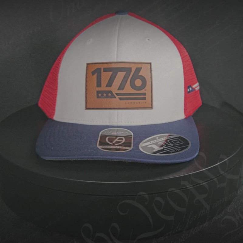 1776® Leather Patch Hat in White and Red with embroidered logo, perfect for patriotic style and comfort.